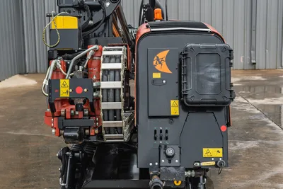 Ditch Witch JT20 HDD unit rear view showing drill pipe reel, control cab, and engine compartment with 17,000 lbs thrust capacity