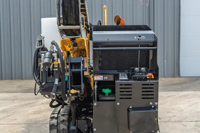 2024 Vermeer D20x22 S3 rear operator console, engine compartment, hydraulic hoses, rubber tracks, and drill frame visible