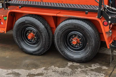 2015 Ditch Witch MR90 mud mixer trailer dual-axle tandem wheels, ST235/80R16 radial tires, black steel rims, orange hubs