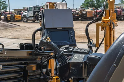 2019 Vermeer D40x55 S3 operator control panel with digital display, joystick controls, and function buttons; drill frame visible