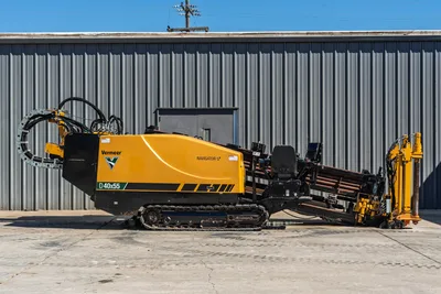 2021 Vermeer D40x55 S3 HDD drill, full side profile, rubber tracks, loaded drill pipe rack, hydraulic lines, Navigator system visible