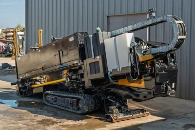 2016 Vermeer D23x30 S3 HDD drill, rear 3/4 view, rubber tracks, cable carrier arm, fluid tank, anchor plate visible