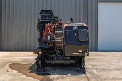 2018 Ditch Witch JT30 All Terrain HDD rig, rear view, drill carriage, hydraulic system, engine compartment, rubber tracks visible
