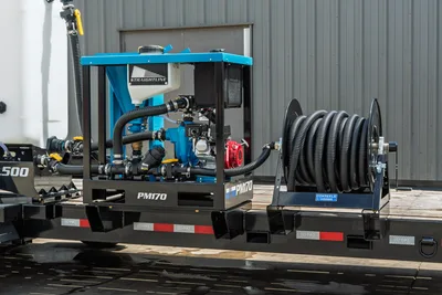 Behnke CBCT2324E-BT-R trailer deck with Straightline PM170 mud mixer and Coxreels hose reel, Honda engine, black corrugated hose