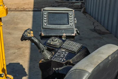 2016 Vermeer D23x30 S3 operator control panel with joystick, display monitor, and function keypad showing wear from use
