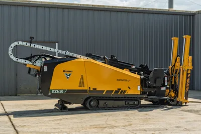 2022 Vermeer D23x30 S3 HDD drill, driver-side view, yellow, rubber tracks, drill frame, pipe loader, cable carrier visible