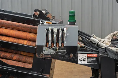 Internal operator controls and drill rod rack on Ditch Witch JT4020 MACH 1 horizontal directional drill.