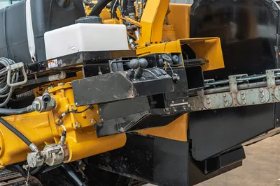 2017 Vermeer 40x55 S3 drill operator station, showing hydraulic controls, fluid reservoirs, and heavy-duty frame components.