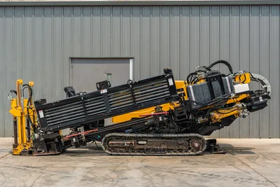 2014 Vermeer 24x40 Series II HDD with steel tracks, drill pipe rack, hydraulic components, and elevated drill rig assembly.