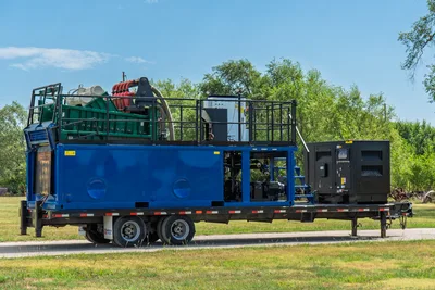 2023 American Augers M300DH mud recycling system on tandem-axle trailer; blue tank, shaker deck, pump components, black generator unit