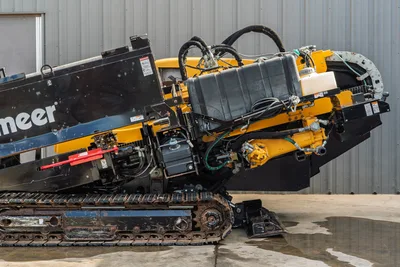 2018 Vermeer D24x40 S3 HDD rig side view showing drill frame elevated, hydraulic lines, carriage, rubber tracks, and wear-used condition