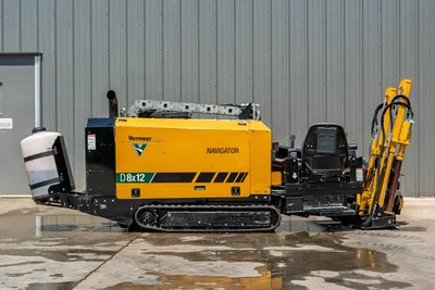 2021 Vermeer D8x12 Navigator HDD drill, full profile view, rubber tracks, drill rod loaded, operator seat, fluid tank visible