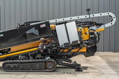2024 Vermeer D20x22 S3 HDD drill, side view showing hydraulic system, cable track, fluid tank, rack & pinion, rubber tracks