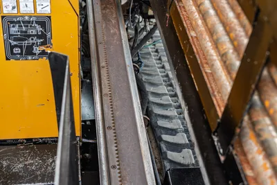 2016 Vermeer D23x30 S3 toothed thrust rack, rubber track, and drill pipe rods visible in close-up detail view