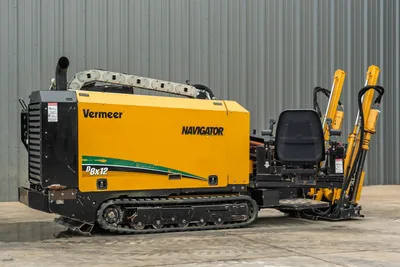 2018 Vermeer D8x12 Navigator HDD drill, driver-side profile, rubber tracks, operator seat, drill frame, pipe rack visible