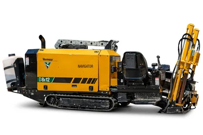 2021 Vermeer D8x12 Navigator HDD drill, 3/4 angle, yellow housing, rubber tracks, drill frame, fluid tank, operator controls visible