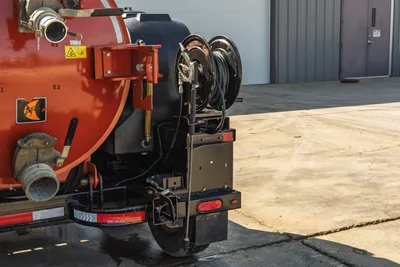 2022 Ditch Witch HX30 rear view showing hose reels, suction inlet, mud tank, trailer hitch, and safety reflectors