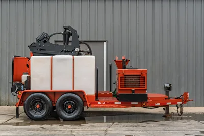 2015 Ditch Witch MR90 mud recycler, full side view, tandem-axle trailer, white poly tanks, mixing hopper, engine compartment