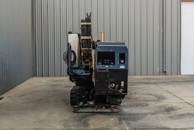 2016 Vermeer D23x30 S3 HDD drill, rear view, rubber tracks, engine compartment panel, drill rack, fluid tank, ground anchor plate visible