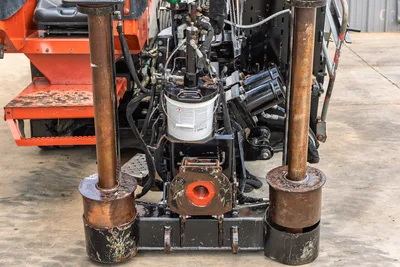 2021 Ditch Witch JT28 rear anchor assembly, dual anchor posts, drill entry box, hydraulic lines, orange step visible
