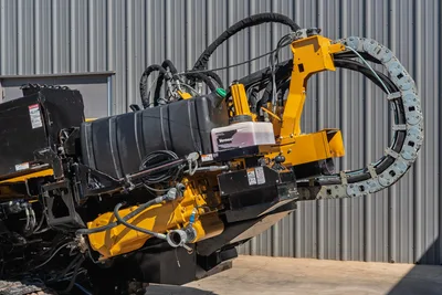 2021 Vermeer D40x55 S3 drill frame closeup showing pipe carousel, hydraulic hoses, and Navigator fluid bottle