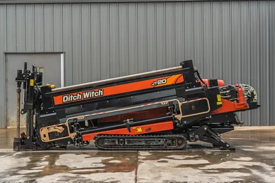 2018 Ditch Witch JT20 horizontal directional drill, side profile view, showing tracks, drill rack, and engine compartment.