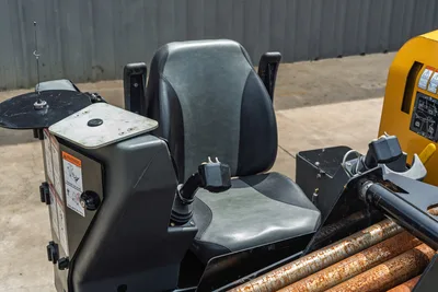 2024 Vermeer D20x22 S3 operator seat with joystick control, locator antenna mount, and drill pipe rack visible foreground