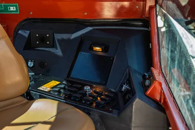 Interior cab operator station of 2016 Ditch Witch JT30 All Terrain drill rig showing console, switches, and pilot seat.