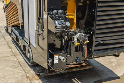 Vermeer 10x15 S3 HDD drill rig rear view showing engine, rotary head, hydraulic pump, and control panel with 1,500 ft-lb torque