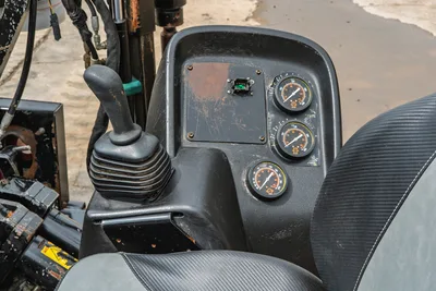 Operator station of 2018 Ditch Witch JT10 HDD showing joystick control, hydraulic pressure gauges, and rugged operator seat.
