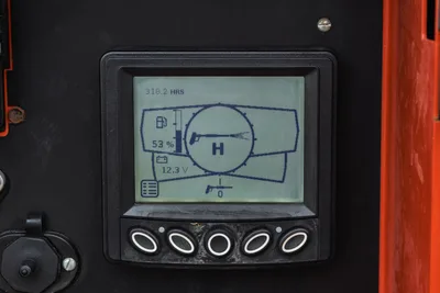 2019 Ditch Witch HX30 digital display monitor showing 318.2 engine hours, fuel levels, and current system voltage status.