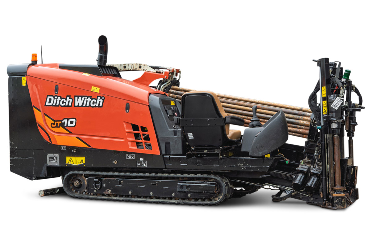 2022 Ditch Witch JT10 HDD drill, side view, rubber tracks, loaded drill pipe rack, operator seat, and drill frame visible