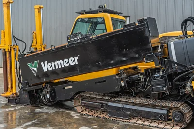 2017 Vermeer 40x55 S3 horizontal directional drill side view showing tracks, drill carriage, cab, and hydraulic stabilizers.