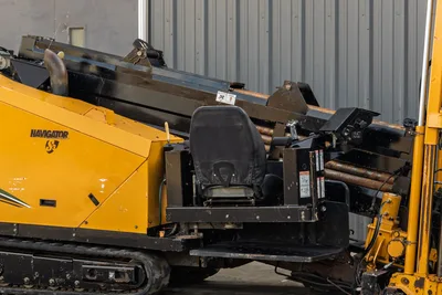 2016 Vermeer D23x30 S3 Navigator operator seat, drill pipe rack, carriage, rubber tracks, yellow hood visible