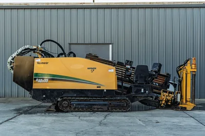 2019 Vermeer D40x55 S3 Navigator HDD drill, full profile view, rubber tracks, loaded drill pipe rack, hydraulic lines, anchor system visible