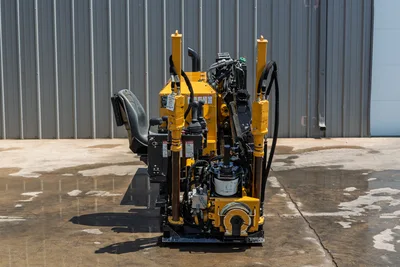 2021 Vermeer D8x12 HDD drill, rear view showing operator seat, hydraulic cylinders, joystick controls, and fluid system components