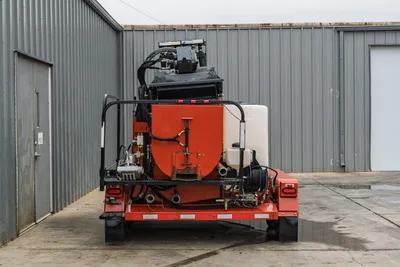 2015 Ditch Witch MR90 mud recycler, rear view, red mixing tank, white poly tank, pump manifold, hydraulic hoses, trailer-mounted frame