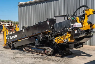 2021 Vermeer D40x55 S3 HDD drill, driver-side angle, drill frame angled up, rubber tracks, hydraulic hoses, yellow carriage visible