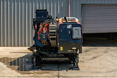 Rear view of 2016 Ditch Witch JT30 All Terrain HDD rig showing engine compartment, drill carriage, and hydraulic stabilizers.