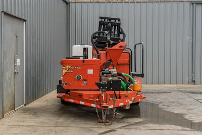 2015 Ditch Witch MR90 mud recycler, rear view on trailer, mixing hopper, pump, green suction hose, hydraulic lines, pintle hitch with chains