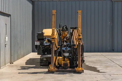 2020 Vermeer D24x40 S3 HDD drill, rear view showing drill pipe rack, vise assembly, hydraulic lines, and operator seat