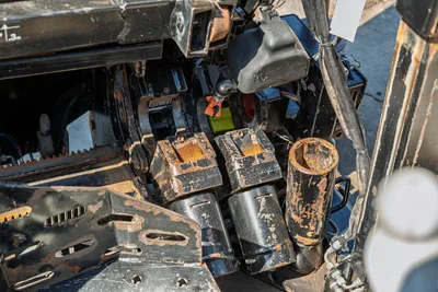 Ditch Witch JT20 drill pipe vise assembly and floating carriage viewed from above, showing clamps and pipe loading system.