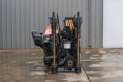 Rear view of 2018 Ditch Witch JT20 HDD drill, showing carriage, drill pipe rack, operator station, and hydraulic systems.