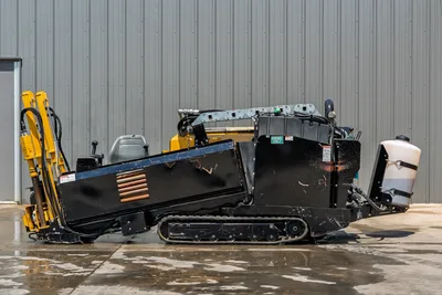 2021 Vermeer D8x12 HDD drill, right-side profile, rubber tracks, yellow drill frame, operator seat, fluid tank, diesel engine compartment visible