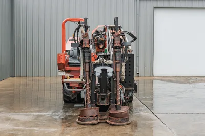 Front view of 2008 Ditch Witch JT4020 MACH 1 HDD rig showing tracked undercarriage, operator cab, and vertical augers.