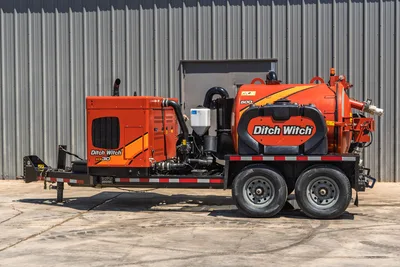2023 Ditch Witch HX30 mud recycler, full driver-side view, trailer-mounted, 500-gal tank, engine compartment, exhaust stack, low hours