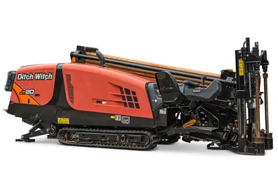 2018 Ditch Witch JT20 horizontal directional drill, side profile view showing tracks, engine housing, and drill pipe rack.