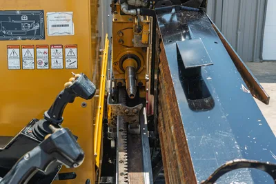 Vermeer 10x15 S3 HDD unit top view showing rotary head, 1.66" drill pipe, control panel, and warning labels