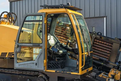 Vermeer 40x55DR S3 HDD rig cab interior, operator controls, drill pipe rack, 140hp engine compartment view