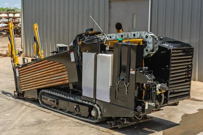 Vermeer 10x15 S3 HDD rig side view with drill pipe carousel, operator cab, engine compartment, tracked undercarriage, 10,000 lb thrust system